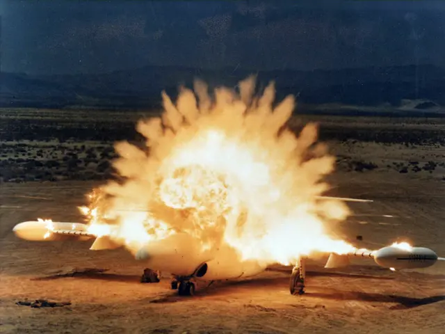 The image shows an airplane in the desert with a large explosion coming out of it, surrounded by...