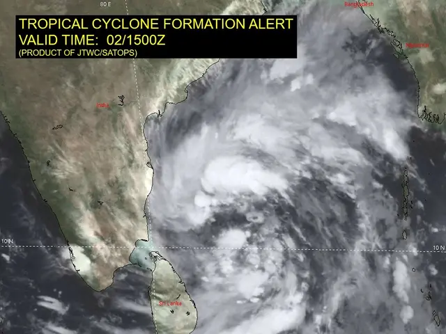 The image shows a satellite view of a tropical cyclone formation alert, with a map of India visible...