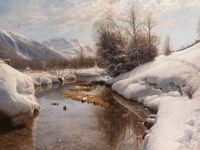 The image shows a winter landscape with a river winding through a snowy mountain range, surrounded...