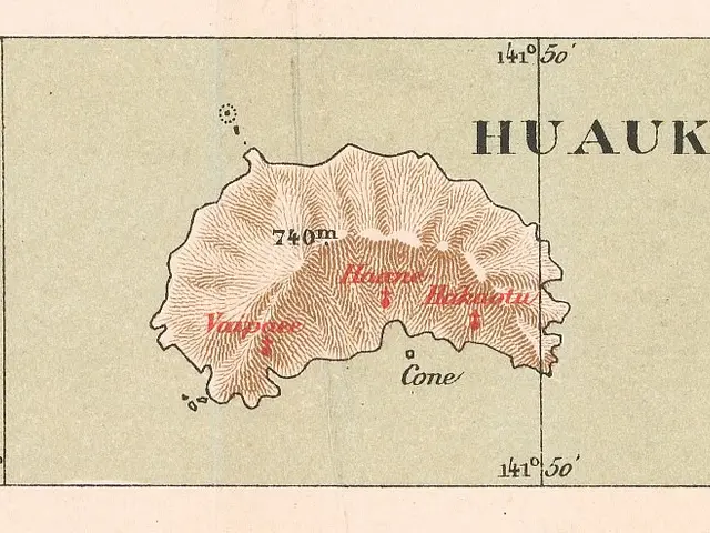 The image shows an old map of the island of Huauka, Hawaii, with text and numbers on a paper. The...