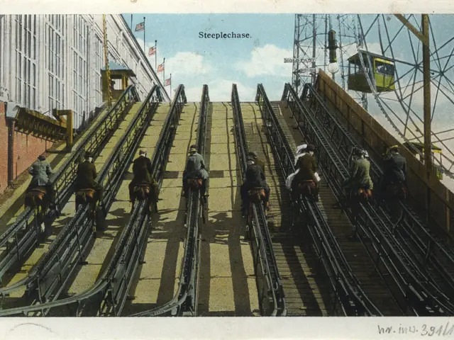 The image shows an old photo of people riding on a roller coaster, with a building on the left...