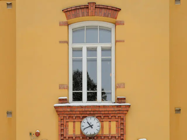 The image shows a yellow building with a clock on the side of it, a door, a window, and a wall. The...