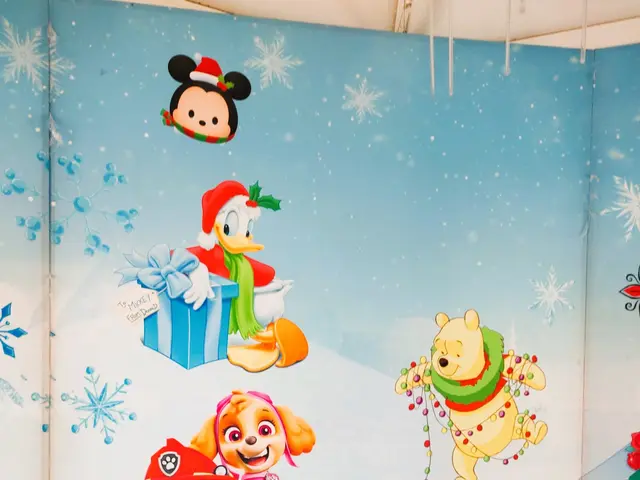 The image shows a festive scene with a banner featuring cartoon images of Paw Patrol characters,...