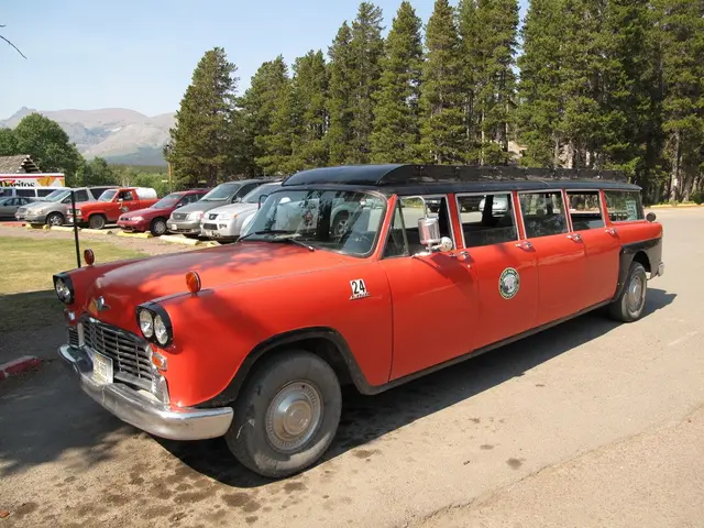 Here there are cars and trees, this is road and a sky.