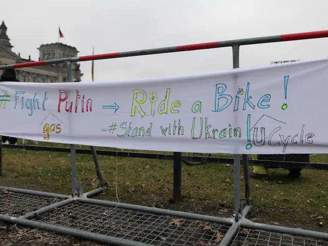 The image shows a group of people standing on the ground, holding a banner that reads "Fight Putin,...