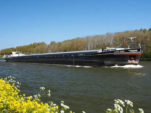 The image shows a large boat traveling down a river, surrounded by lush green trees and a bright...