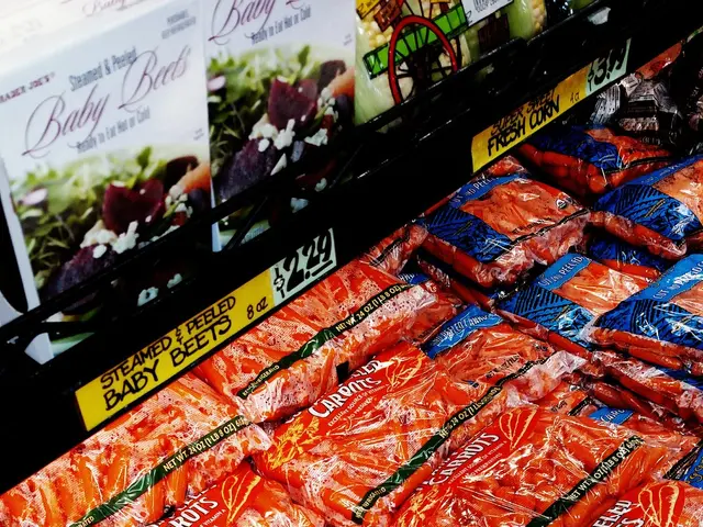 The image shows a grocery store with a display case filled with lots of different types of food,...