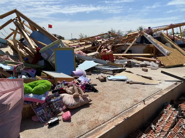 The image shows the aftermath of a tornado in Moore, Oklahoma, with a pile of rubble consisting of...