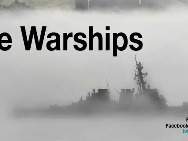 The image shows a poster with the words "I Drive Warships" written on it, with a few ships on the...