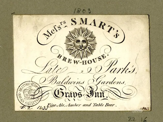 The image shows an old business card with a sun on it. The card has text written on it, as well as...