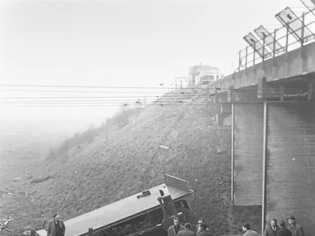 The image shows a black and white scene of a train accident on the tracks, with a group of people...