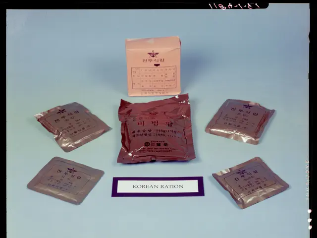 The image shows a blue surface with a few packets and a paper with text written on it, as well as a...