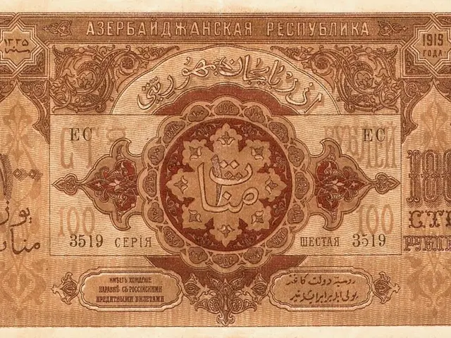 The image shows an old banknote with Arabic writing on it. The paper has numbers and text written...