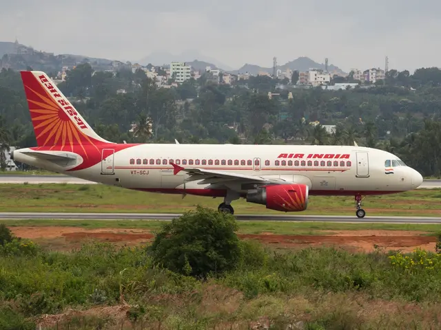 The image shows an Air India Airbus A320-200 on the runway at Mumbai Airport, surrounded by lush...