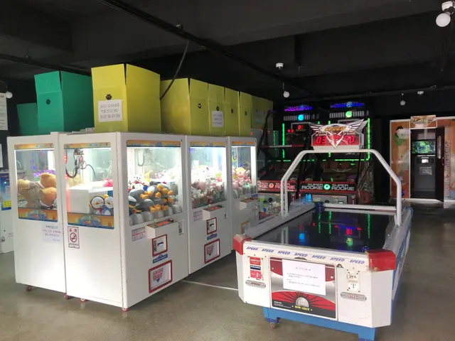 The image shows a room filled with lots of different types of arcade games, including a game...