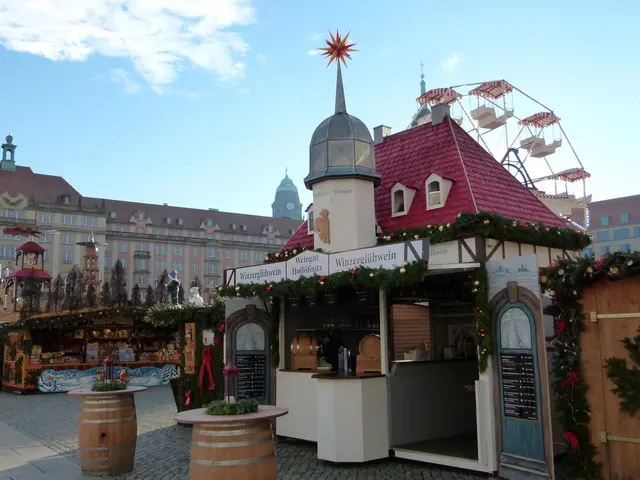 The image shows a bustling Christmas market in the middle of a city square, with buildings, street...