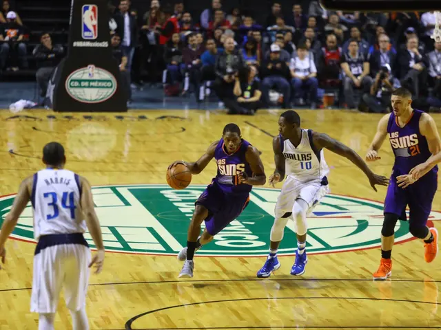 The image shows a basketball game between the Phoenix Suns and the Dallas Mavericks. We can see...