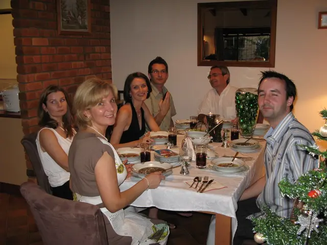 In the image we can see some group of people sitting around the table. And some people were...