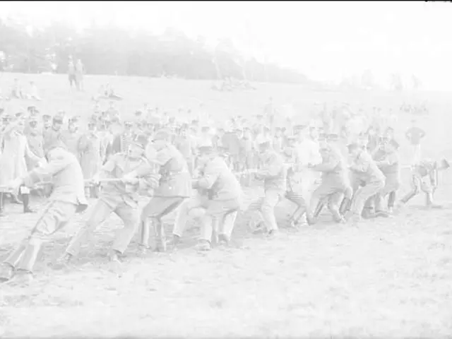 The image shows a group of men playing baseball in a field, with some of them holding baseball bats...