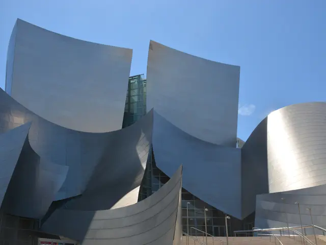 The image shows the ARTIST Concert Hall in Los Angeles, California. It is a modern building with...