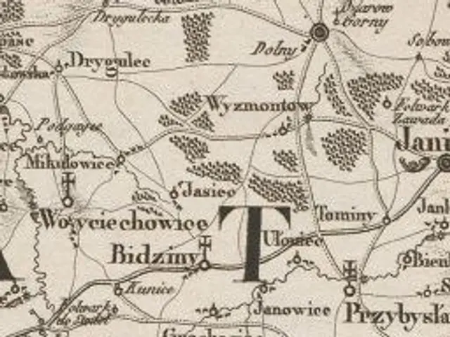 The image shows an old map of the city of Tbilisi, Georgia, with text written on it. The map is...