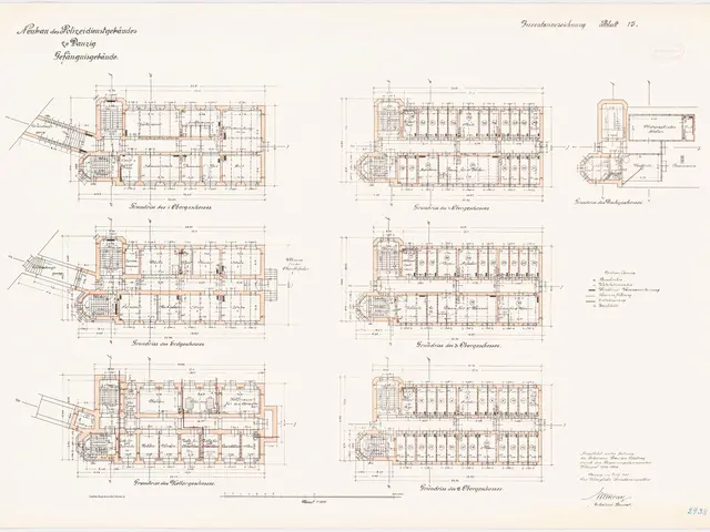The image shows a drawing of a building with a lot of plans on a white paper. The paper is filled...