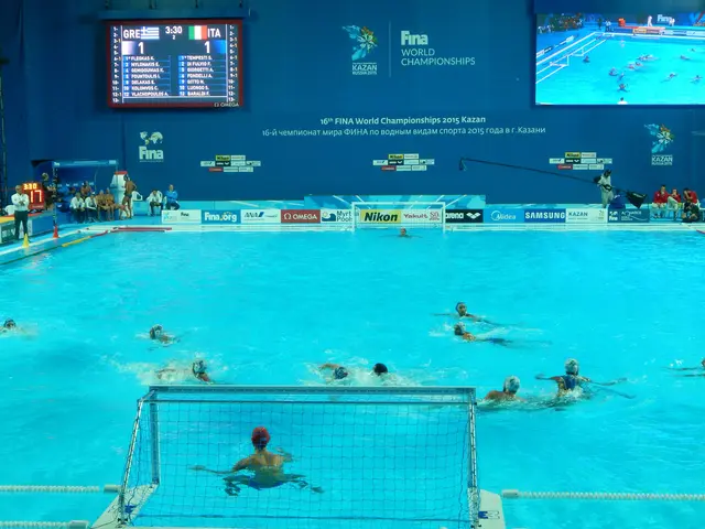 The image shows a group of people playing water polo in a large pool, with a net in the middle and...