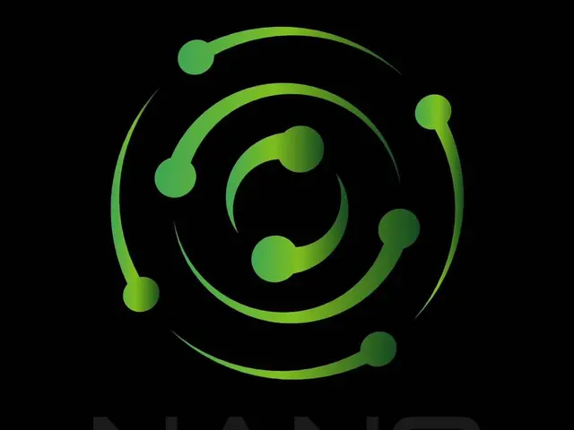 The image shows the logo of Nano Nuclear Energy Inc. in the center of a black background. The logo...