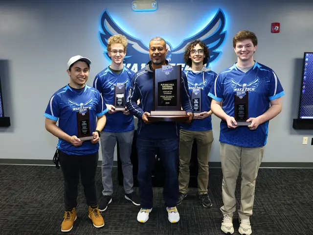 The image shows a group of five men standing next to each other, proudly holding trophies in their...