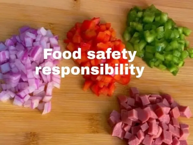 The image shows chopped vegetables on a wooden cutting board with the words "food safety...