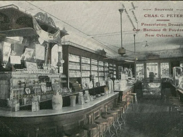 The image shows an old black and white photo of a pharmacy in New Orleans, Louisiana. There are...