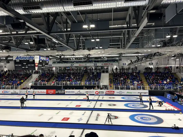 The image shows a group of people playing curling on a rink in front of a large crowd. The rink is...