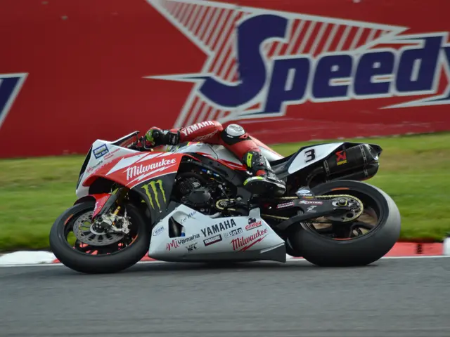 The image shows a person wearing sports dress, gloves, shoes, and footwear while riding a sports...