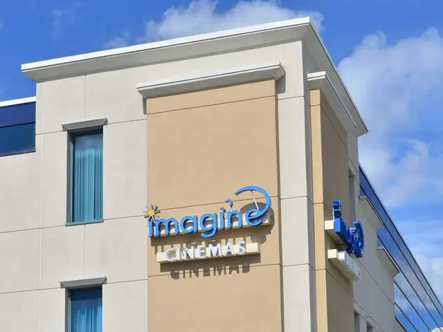 The image shows the Imagine Cinemas in San Diego, California. It is a building with windows and...