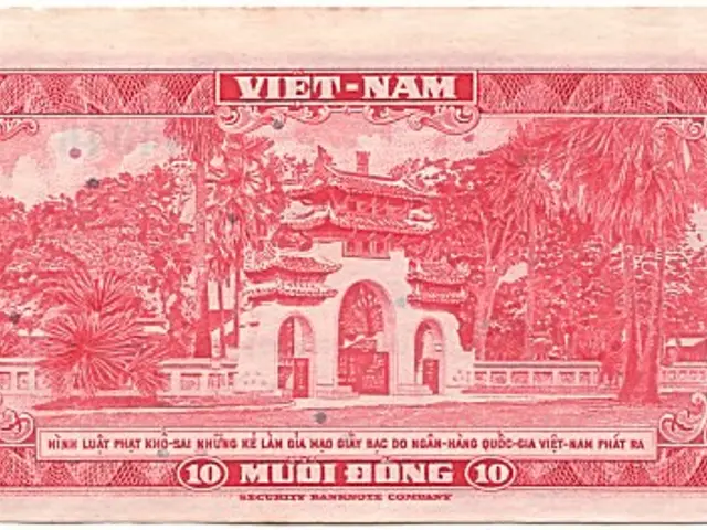 The image shows an old Vietnamese banknote with a picture of a building and trees on it. The text...