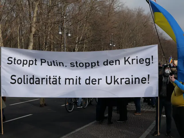 The image shows a group of people standing on the road, holding a banner that reads "Stop Putin,...