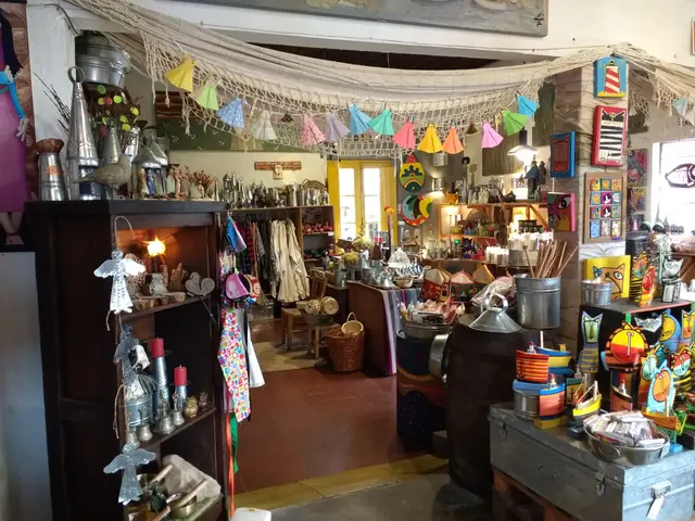 The image shows a room filled with lots of different types of items, including clothes hung on...