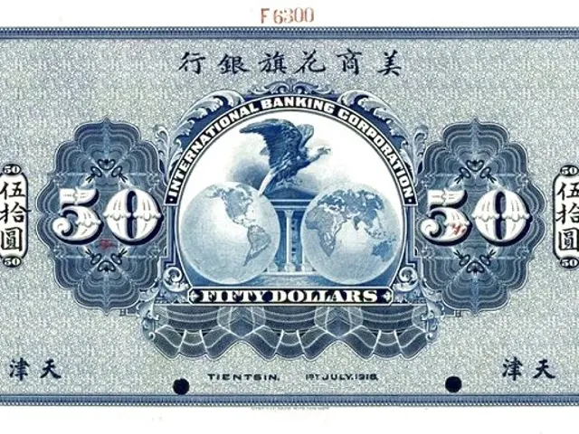 The image shows a blue and white Chinese banknote with a picture of a globe on it. The text on the...
