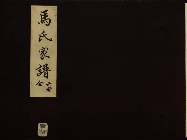 The image shows a black and white photo of a book with Chinese writing on it, which is the first...