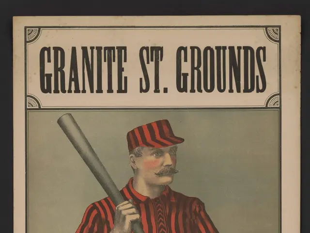 The image shows a man standing and holding a baseball bat in his hands. He is wearing a baseball...