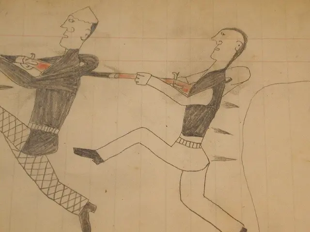The image shows a drawing of two men playing baseball on a piece of paper. One of the men is...