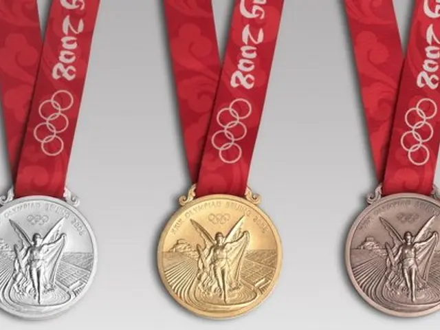 The image shows three Olympic medals with red ribbons on a white background. The medals are silver,...