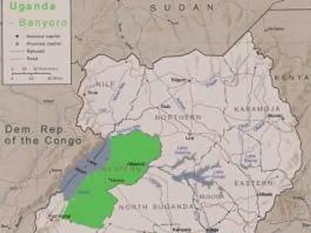 The image shows a map of Uganda with the Democratic Republic of the Congo highlighted in green. The...