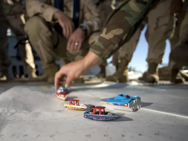 The image shows a group of men in military uniforms playing with toy boats on the floor, with one...