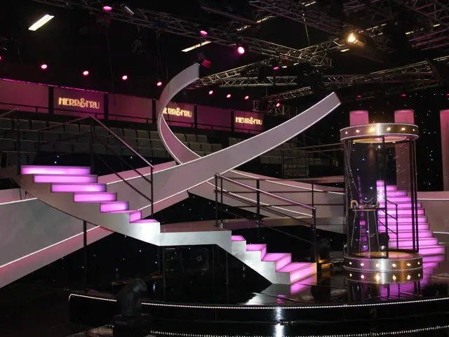 The image shows a stage set up for a show with a spiral staircase, railings, steps, lights, rods,...