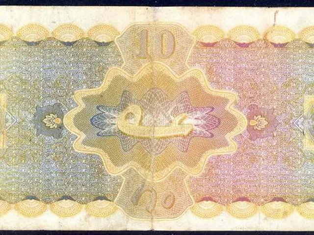 The image shows an old ten dollar banknote with a black background and a picture of a bird on it....