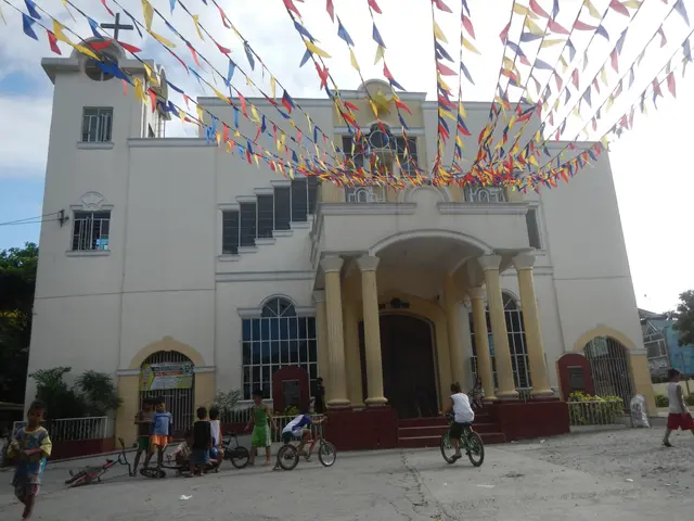 The image shows a group of people riding bicycles in front of a white church with windows, pillars,...