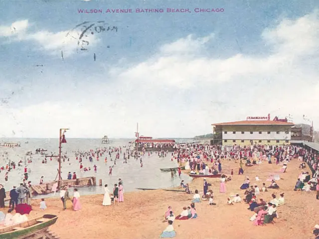 The image shows an old postcard of Wilson Avenue Bathing Beach in Chicago, Illinois. There are many...