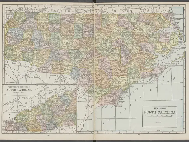 The image shows an open book with a map of North Carolina on it. The map is detailed and shows the...