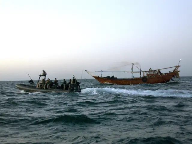 The image shows two boats in the ocean with people on them, one of which appears to be a trawler....